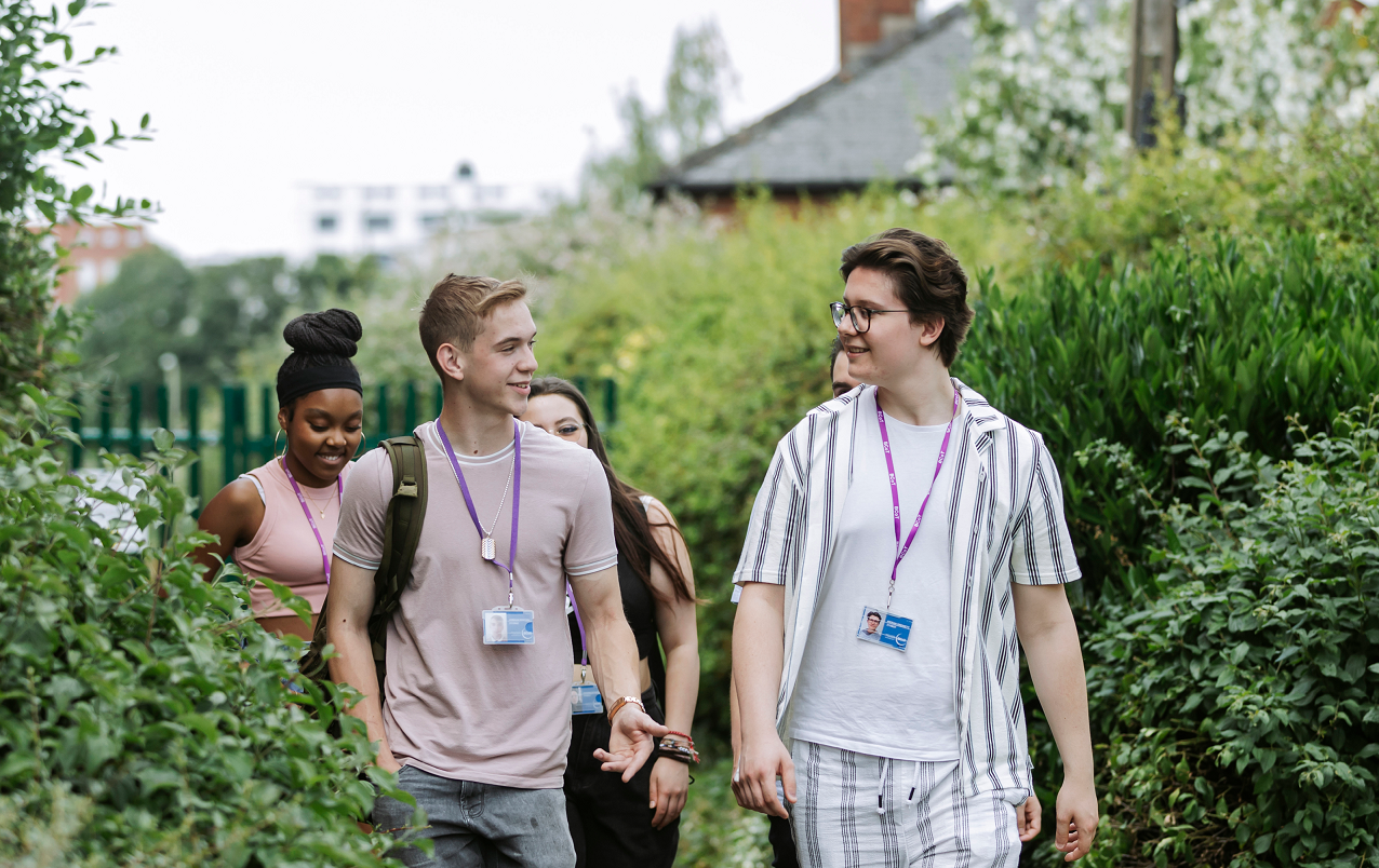 Group of Students Walking Along Path