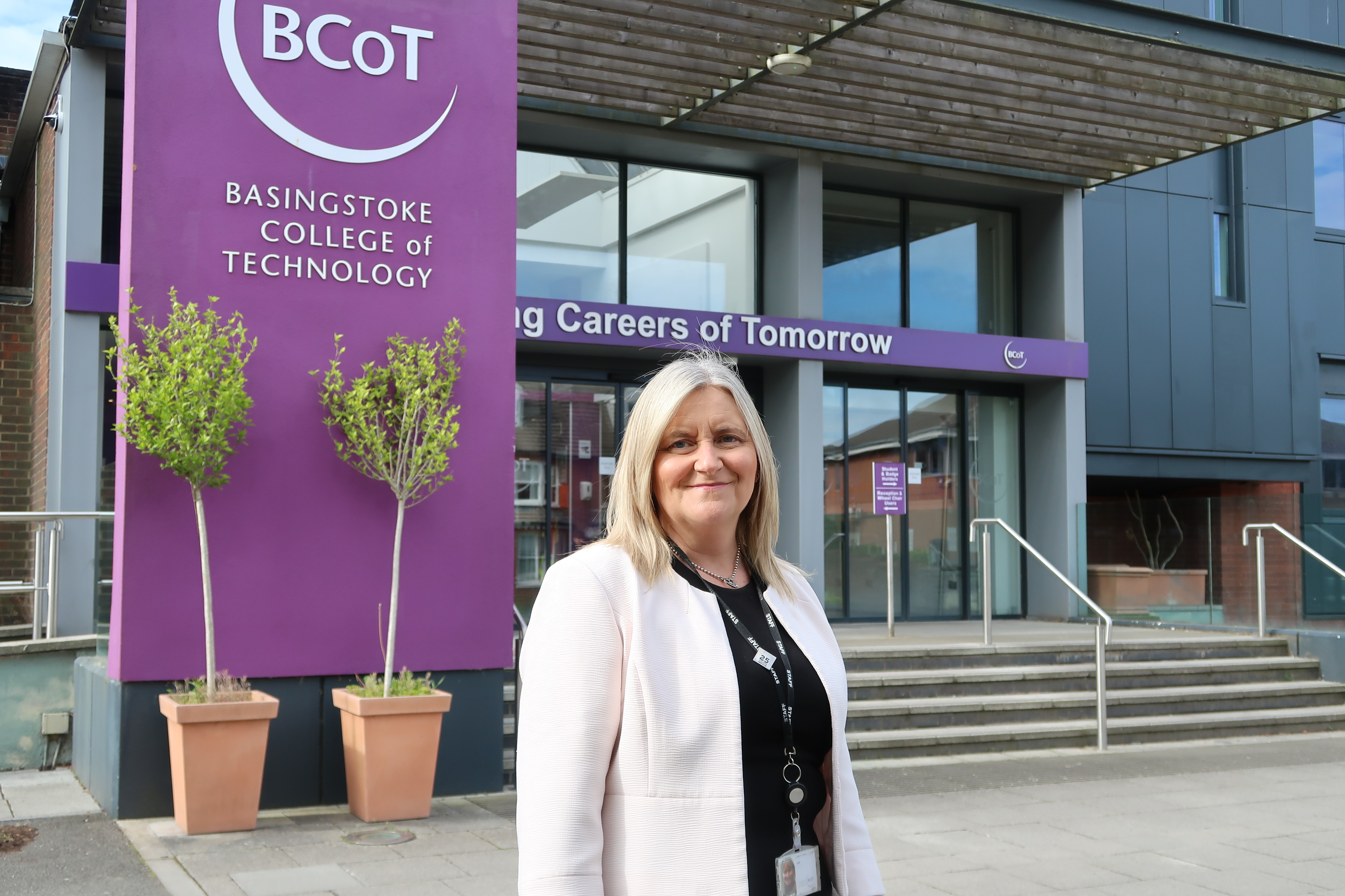 The Principal of Basingstoke College of Technology, Lorraine Heath standing outside the college