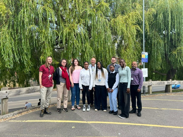 A group of students and teachers celebrate GCSE results day at Basingstoke College of Technology, August 2025